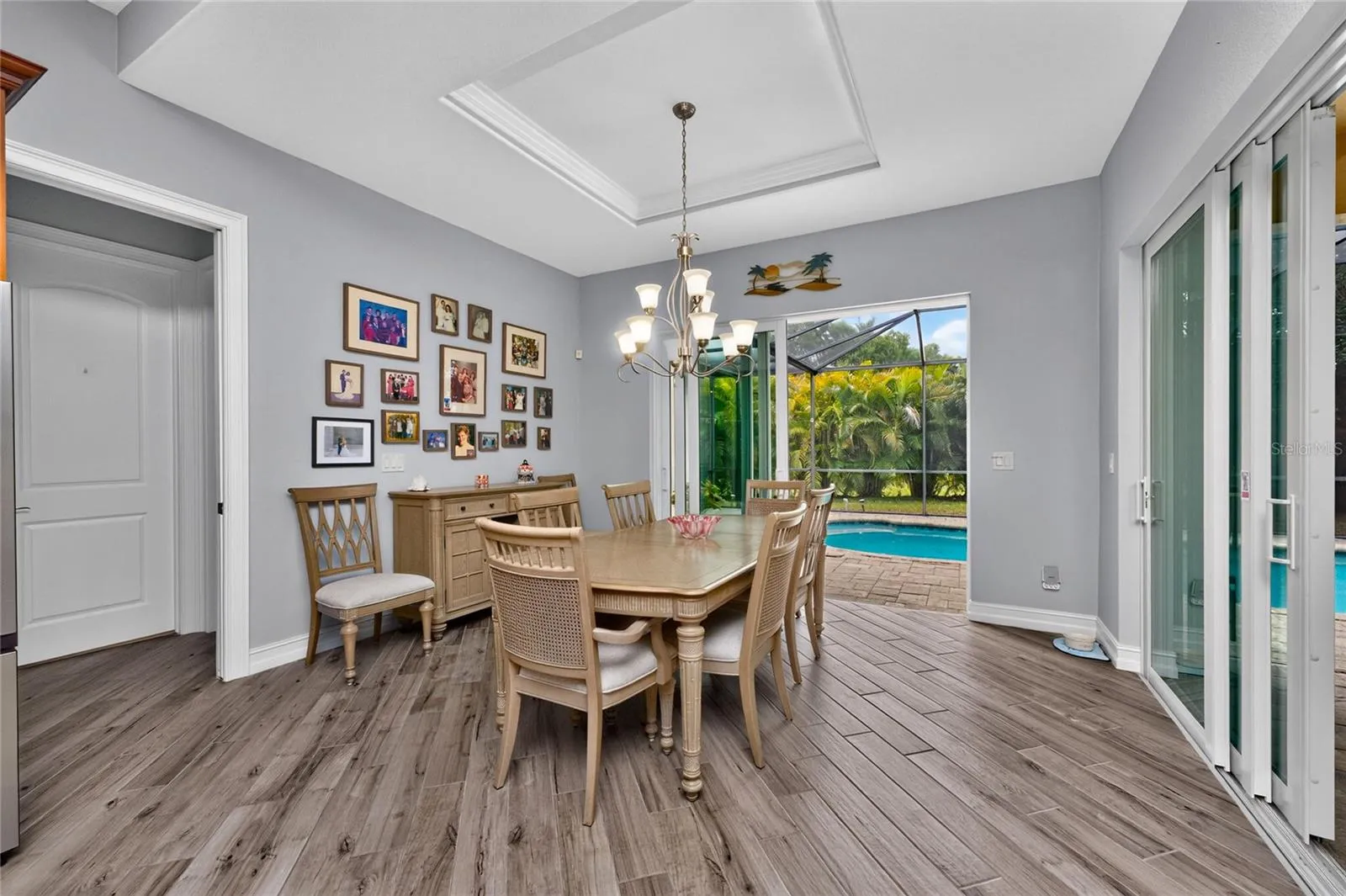 Dining room has pocket slider to lanai