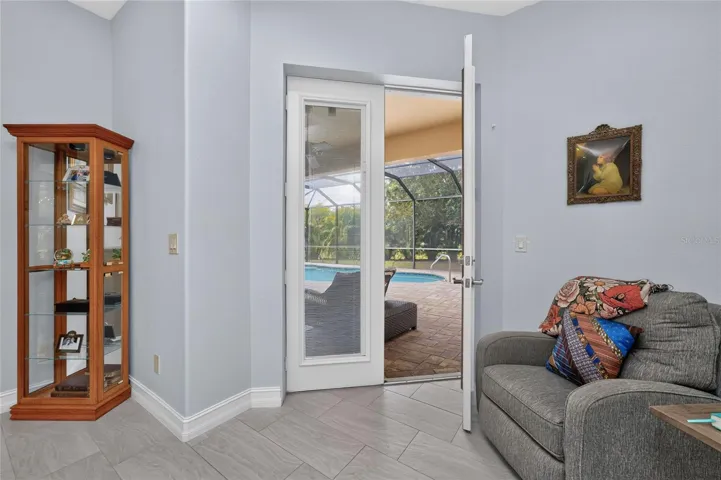 French doors to the lanai and pool