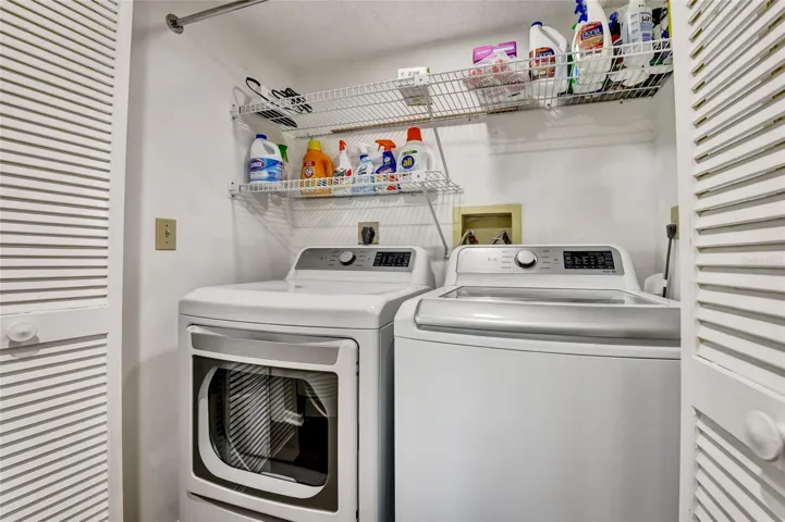 washer and dryer conveniently located.