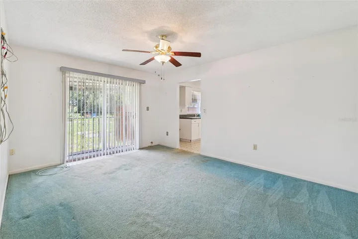 Family Room features glass sliding doors