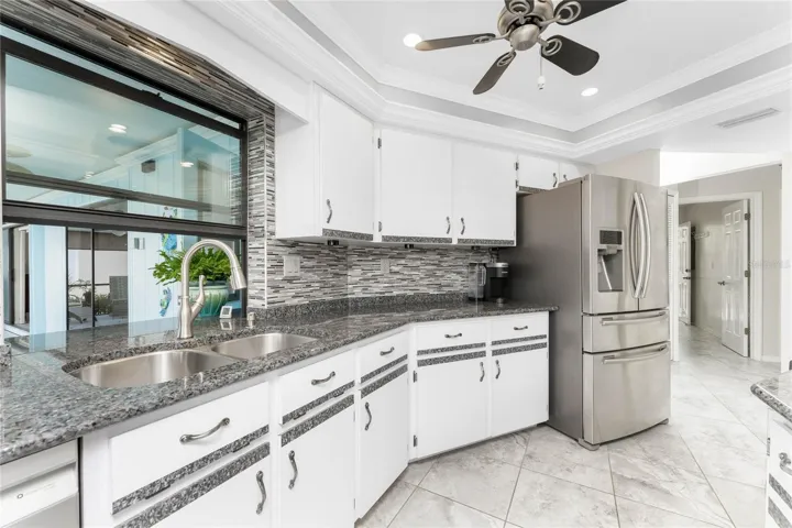 Level 3 Granite Counter with listello blacksplash