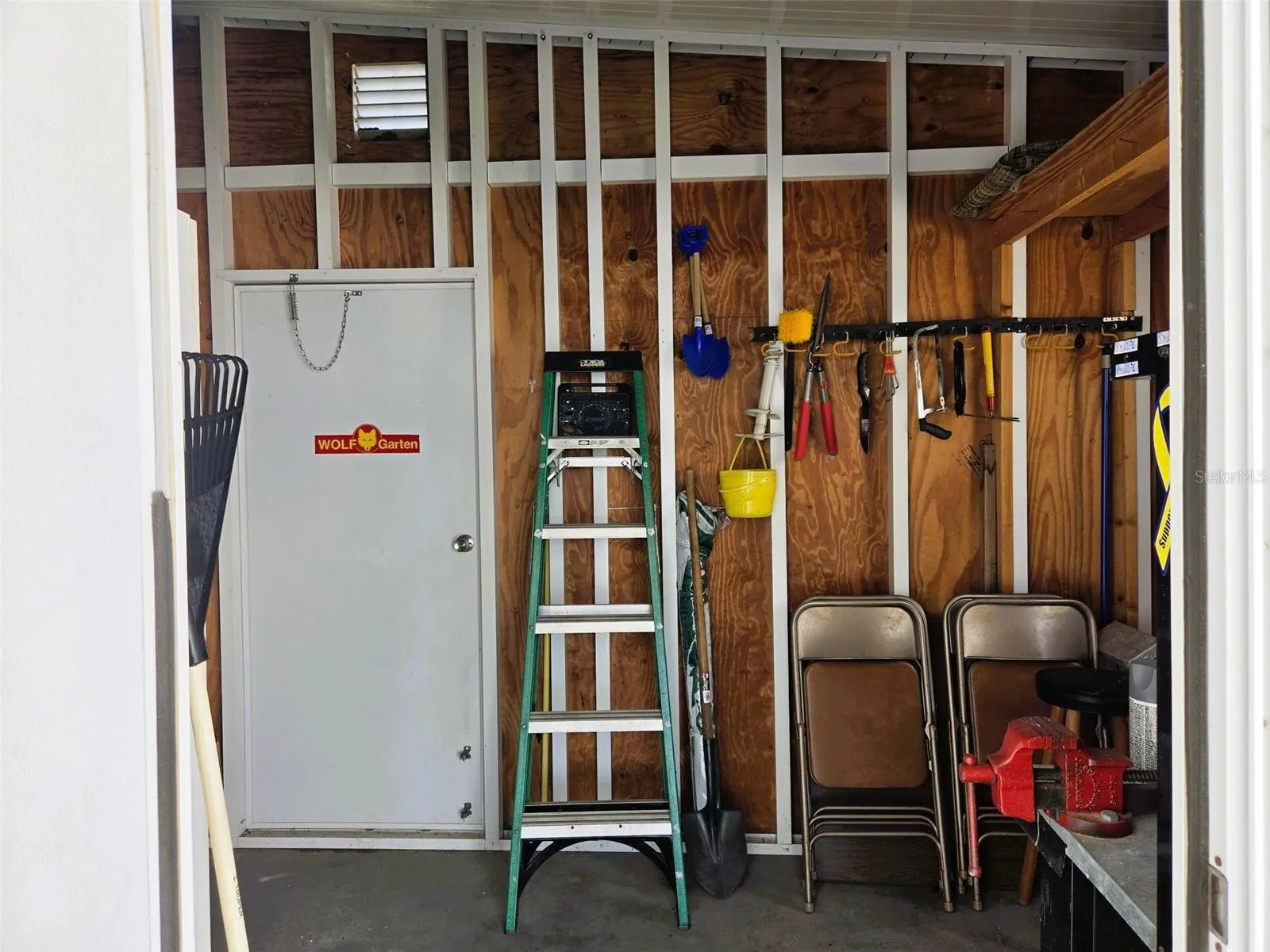Shed with door out to back yard