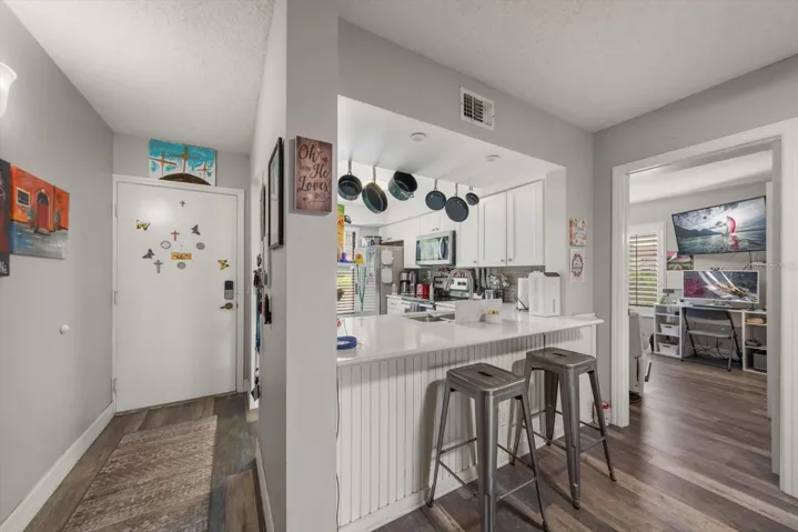 KITCHEN w/VIEW OF FRONT DOOR
