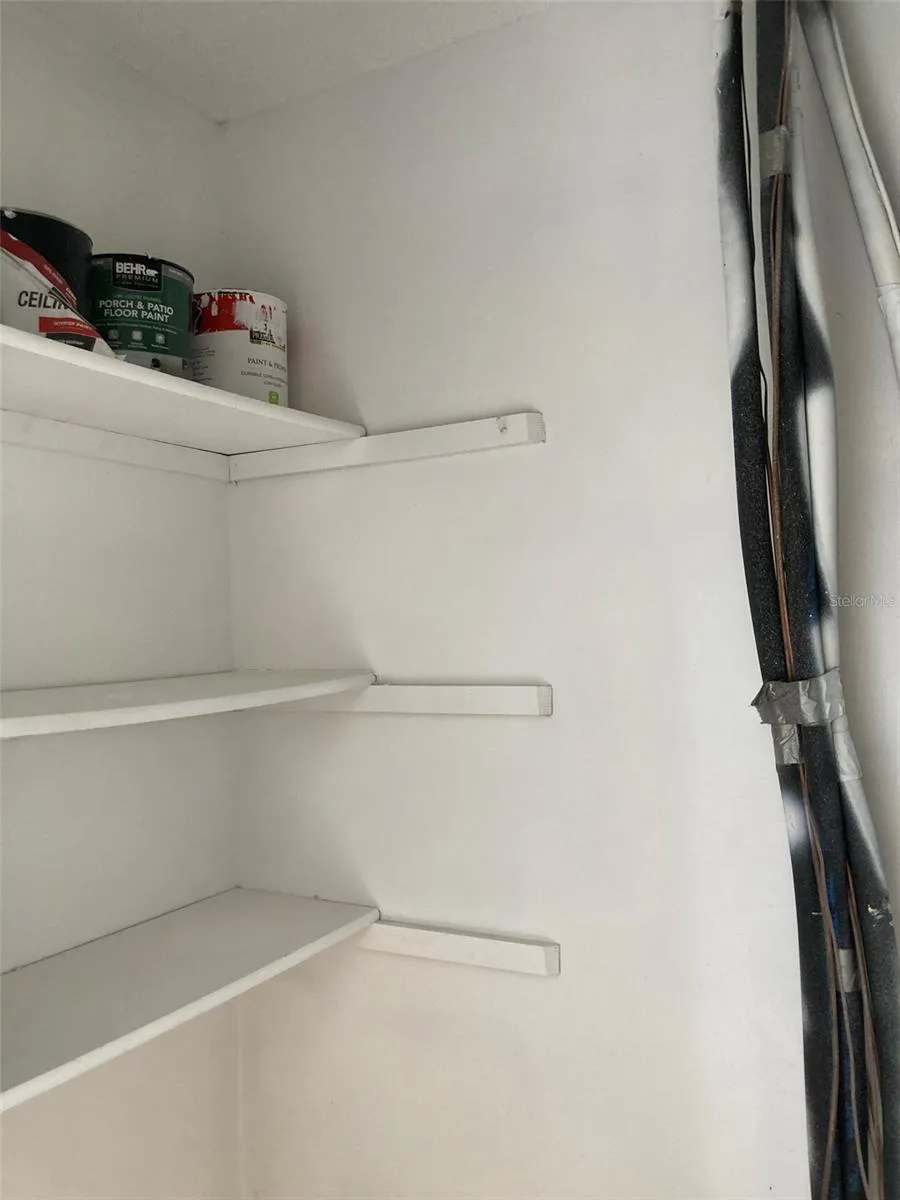 HVAC closet with shelves