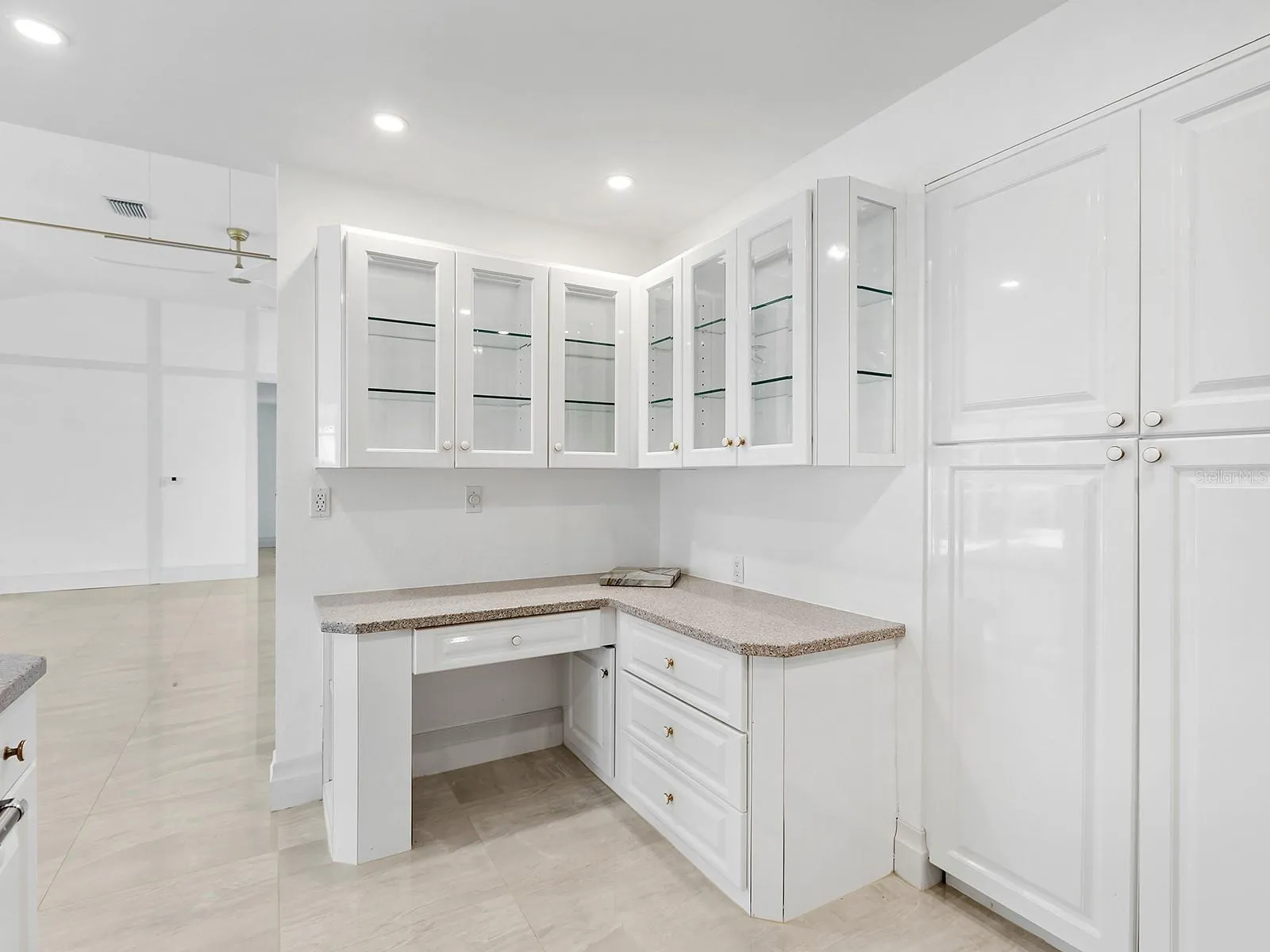Kitchen desk and glassed cabinets