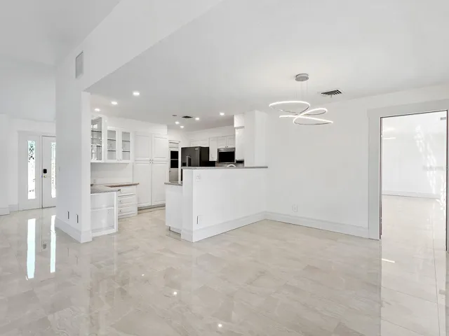 Kitchen island bar to dining area