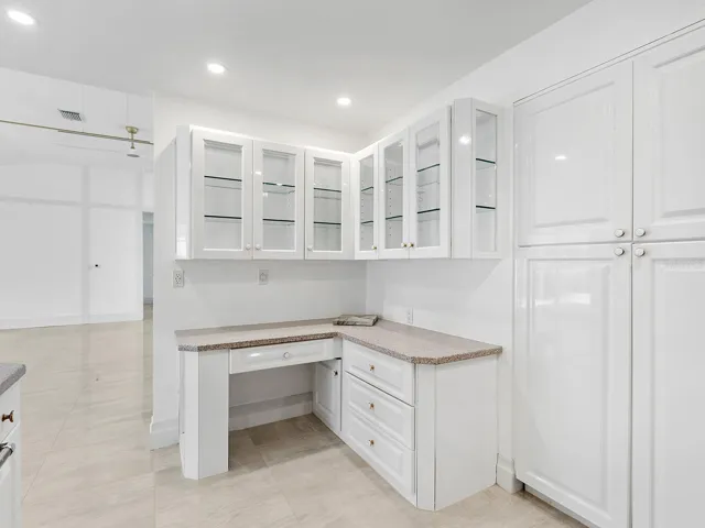 Kitchen desk and glassed cabinets