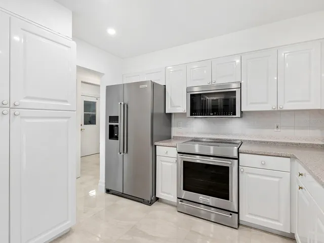 Open kitchen with new Kitcheaid appliances