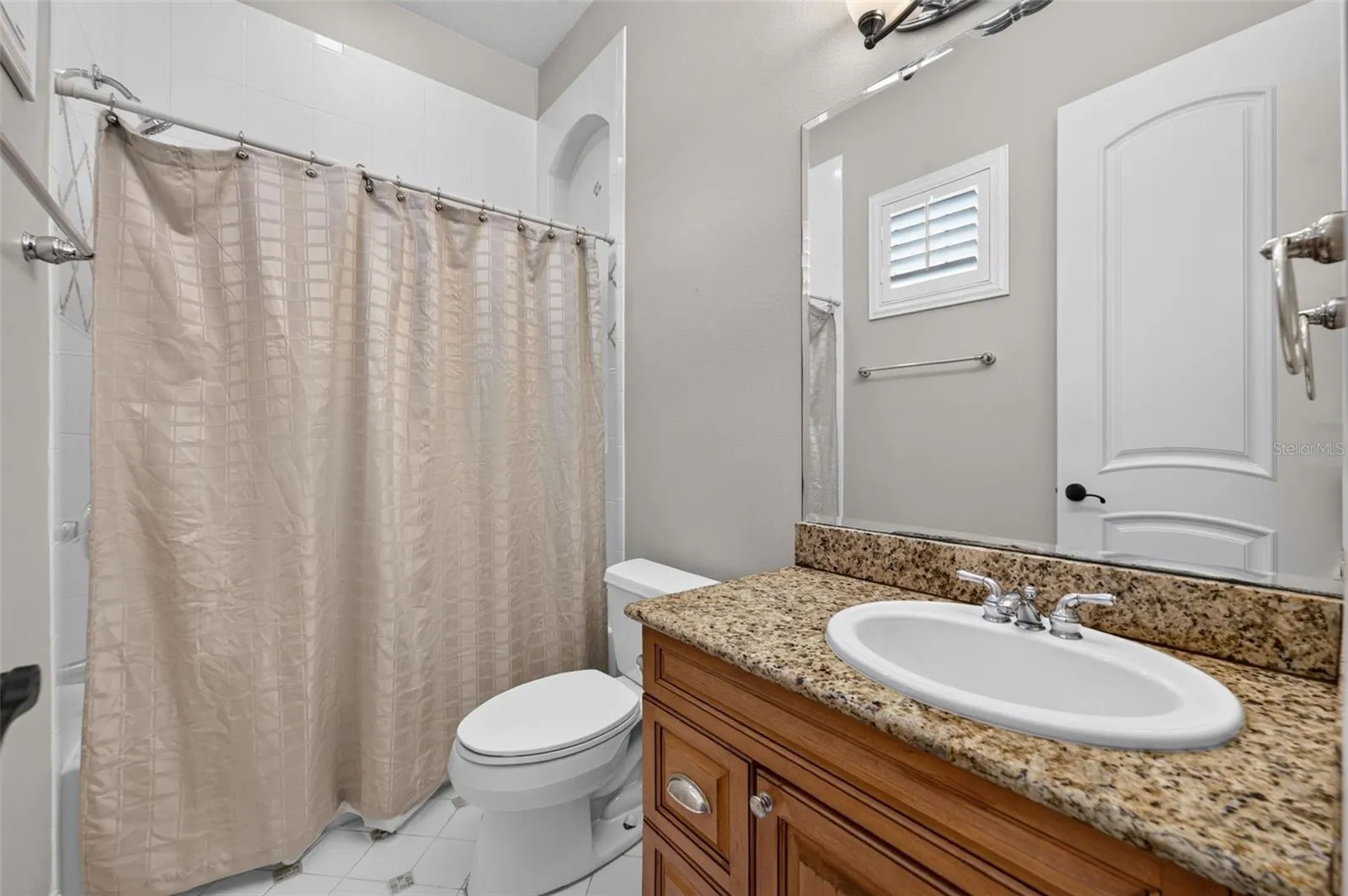 En suite bath with a tub