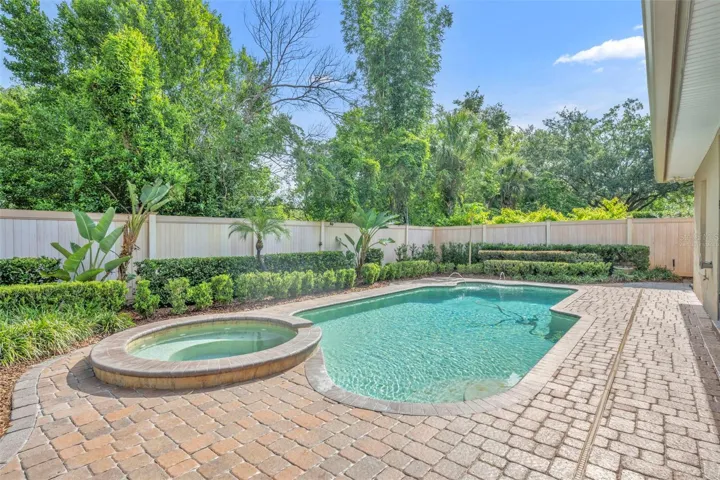 Virtually Staged Landscaping. Enjoy cooling off during these hot days in the saltwater pool and spa