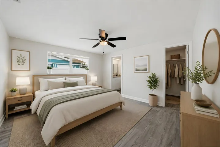 Primary bedroom with walk in closet