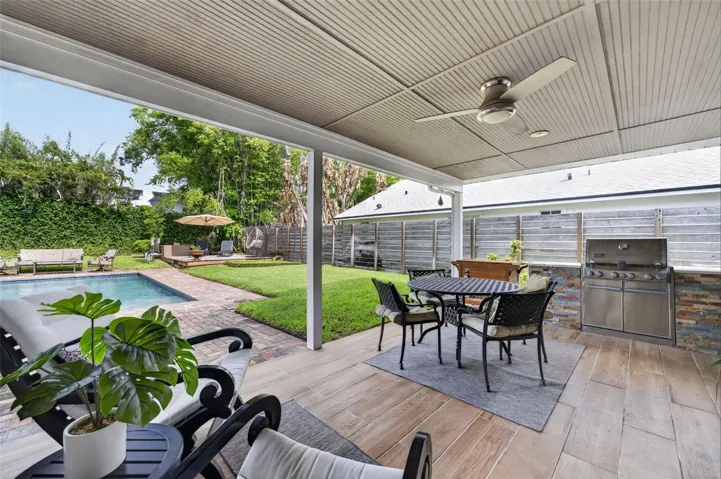 Enjoy spending time with family and friends while cooking on the summer kitchen & enjoying all that the Florida lifestyle has to offer
