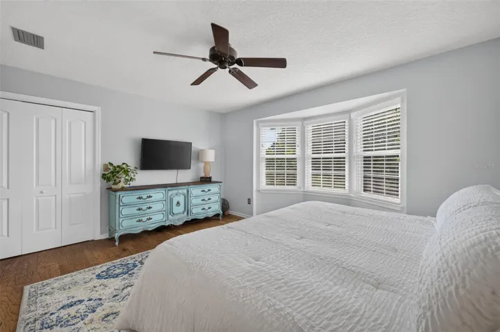 Primary Suite features a custom-built walk-in closet