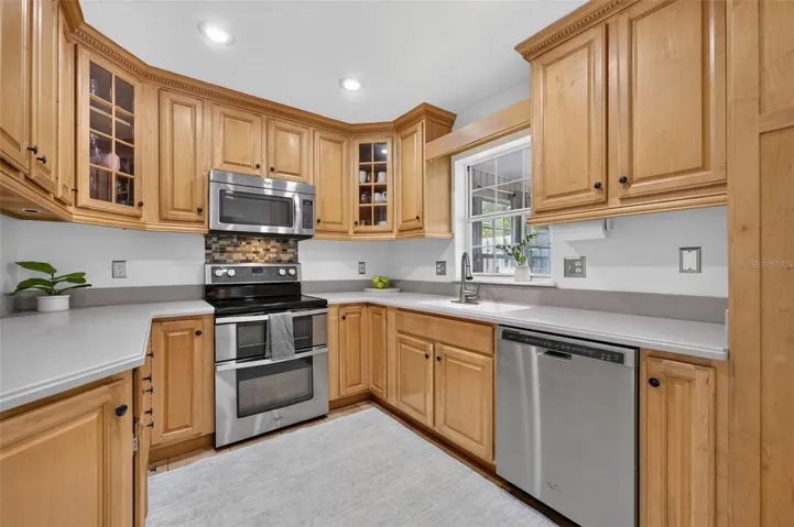 Kitchen with newer stainless steel appliances
