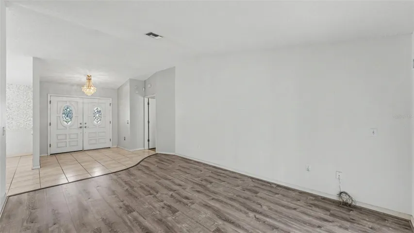 Formal Living at entry/ Den