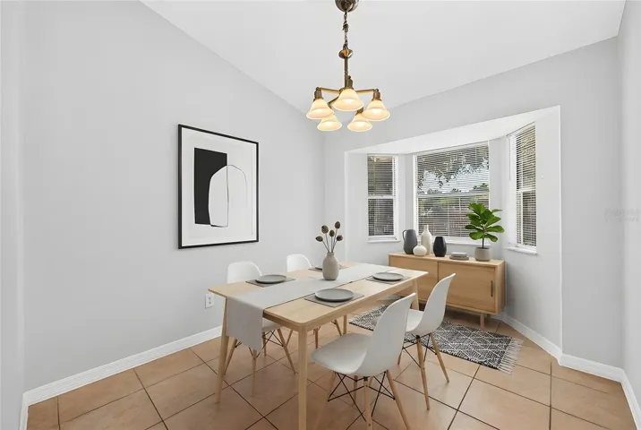 Entertaining is a breeze in the formal dining space. Virtually Staged.