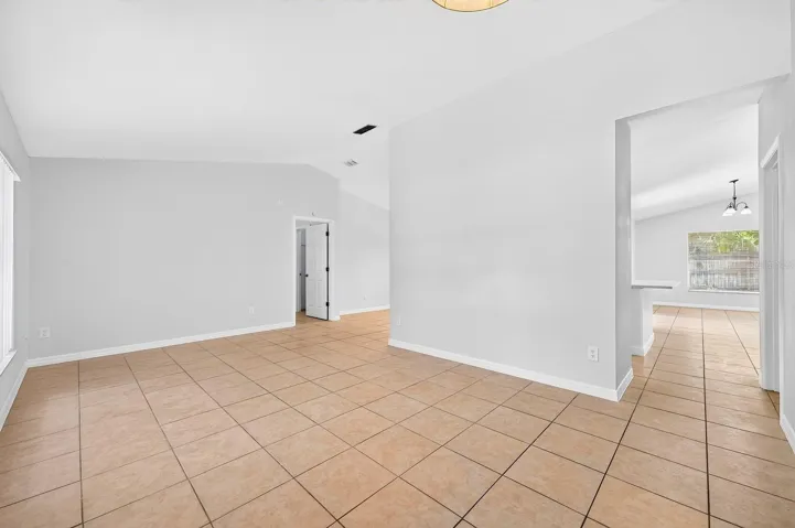Versatile formal living and dining spaces at the front of the home.