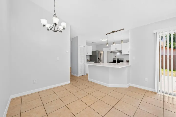 Cozy breakfast nook off the kitchen for casual dining.