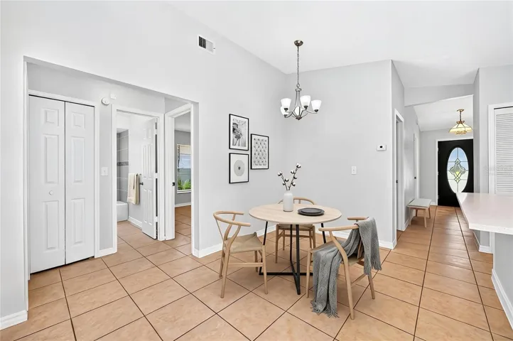 Cozy breakfast nook off the kitchen for casual dining. Virtually Staged.