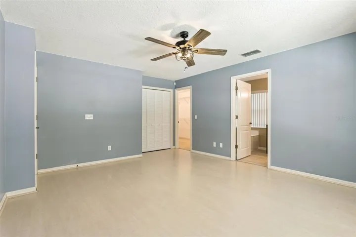 The primary suite has an additional closet on top of the walk in closet