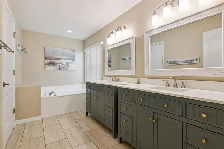 2 sinks in Primary Bath to include a tub and shower.