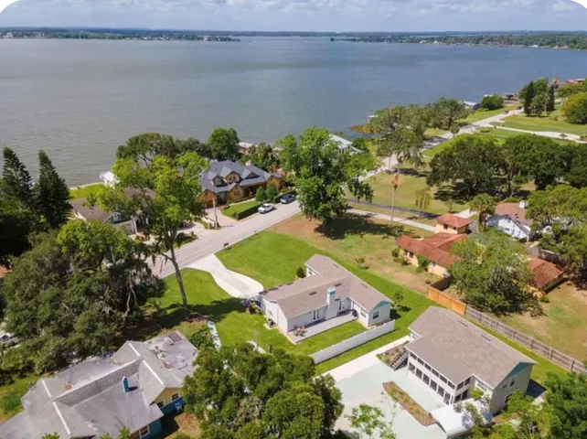 Areal view (Lake Dora is across the street) Triplex in back of main house