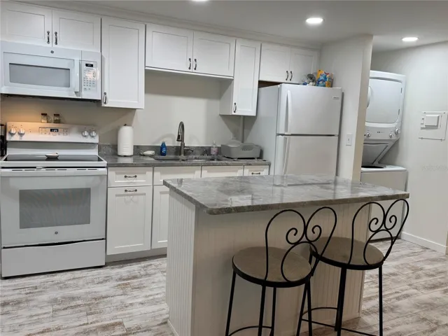 Granite counter tops, newer appliances and island for quick meals