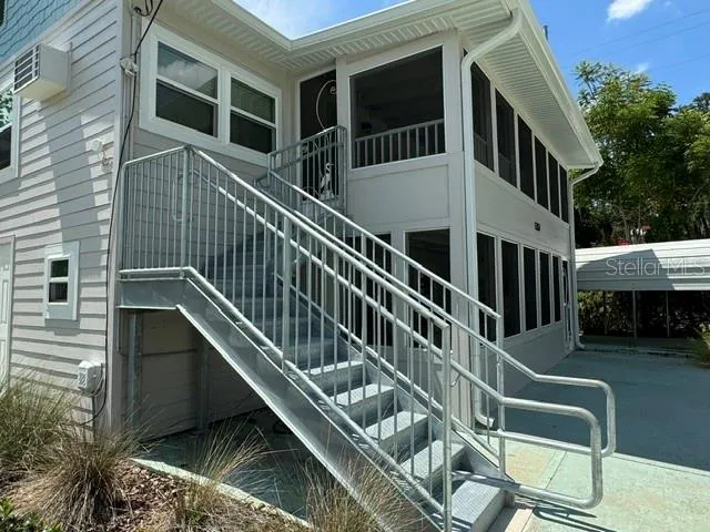 Commercial grade staircase with handrail
