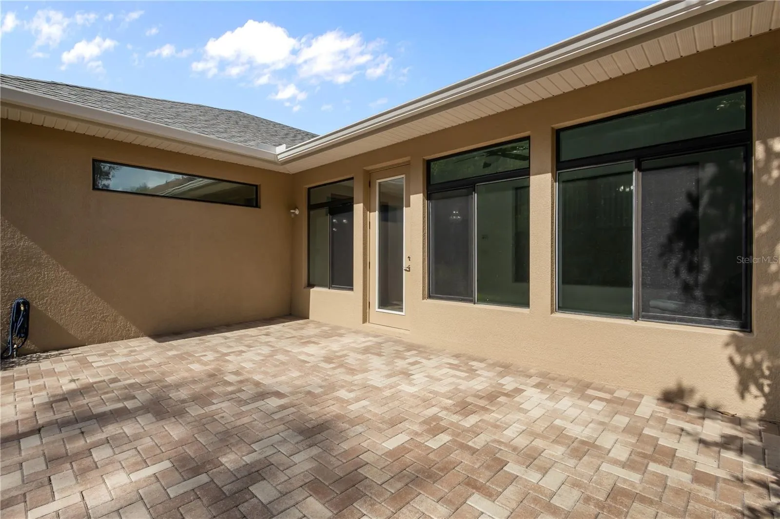 Extended paver lanai provides great space for outdoor entertainment