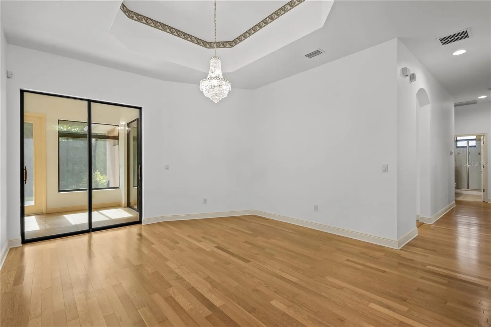 A spacious dining area offers an inviting setting for everyday meals and special gatherings.