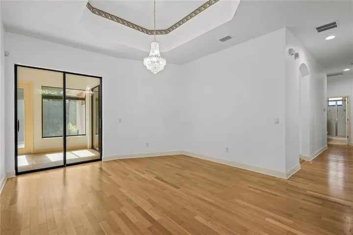 A spacious dining area offers an inviting setting for everyday meals and special gatherings.