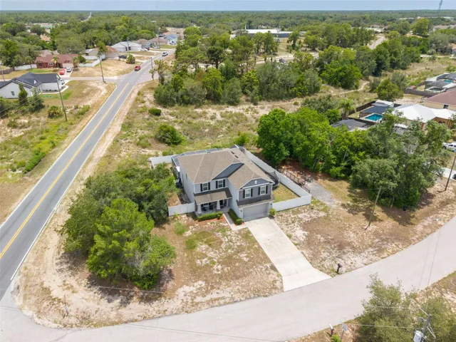 Situated on a desirable corner lot just under one-half acre