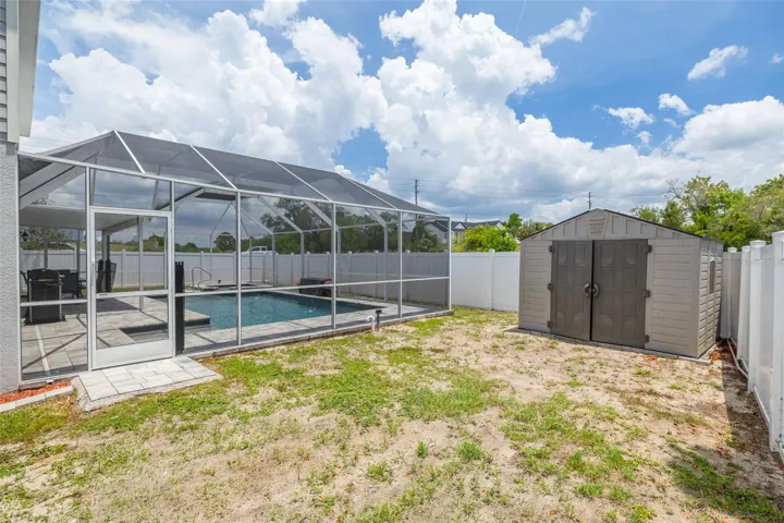 Additional features include double-pane tilt-in windows for effortless cleaning, and a storage shed