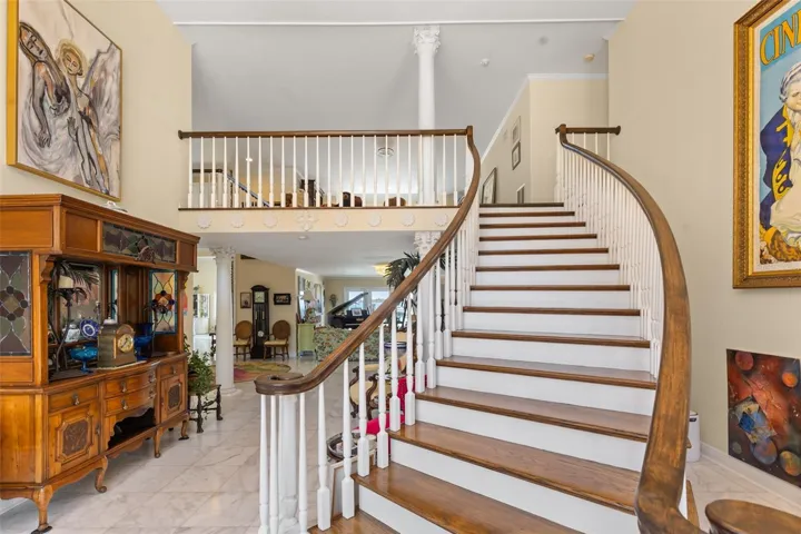 Ascend the grand staircase to the second level, where sweeping views overlooking the Manatee River as it flows toward the Gulf of America.