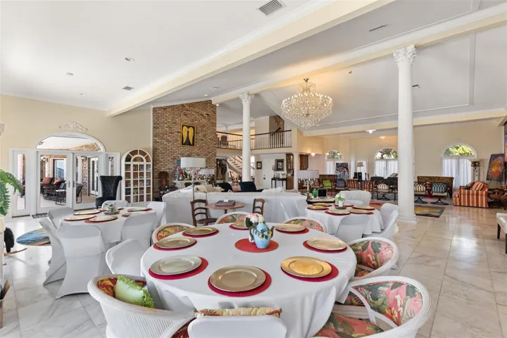The grand Livingroom/Ballroom space overlooking a spectacular setting designed for elegant entertaining and grand-scale gatherings.