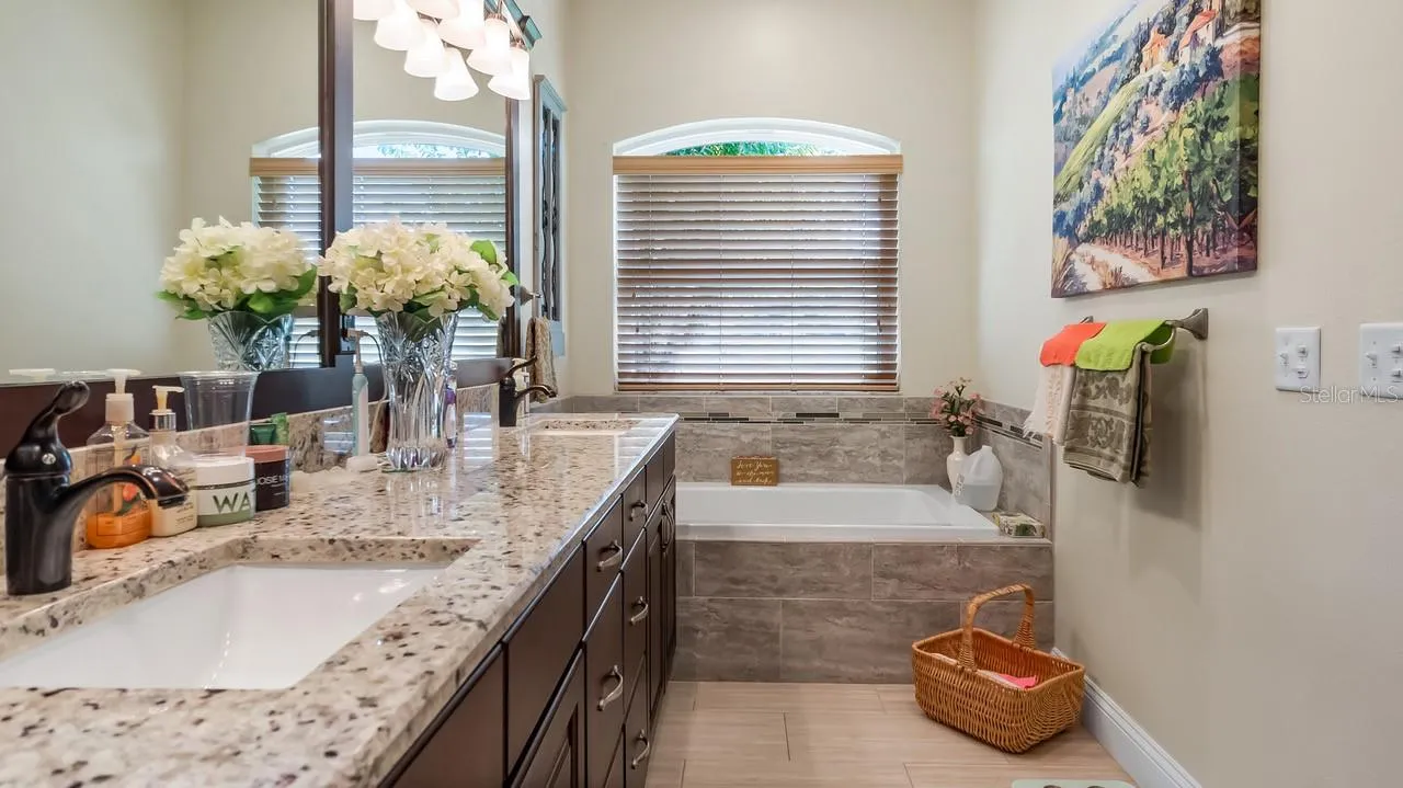 Double Sinks and Tiled Jacuzzi Tub