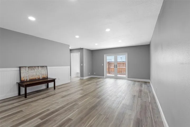 LIVING-DINING ROOM & ENTRY TO PATIO