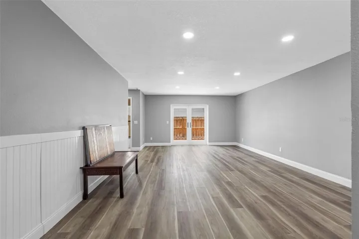 LIVING-DINING ROOM & FRENCH DOORS TO FENCED PATIO