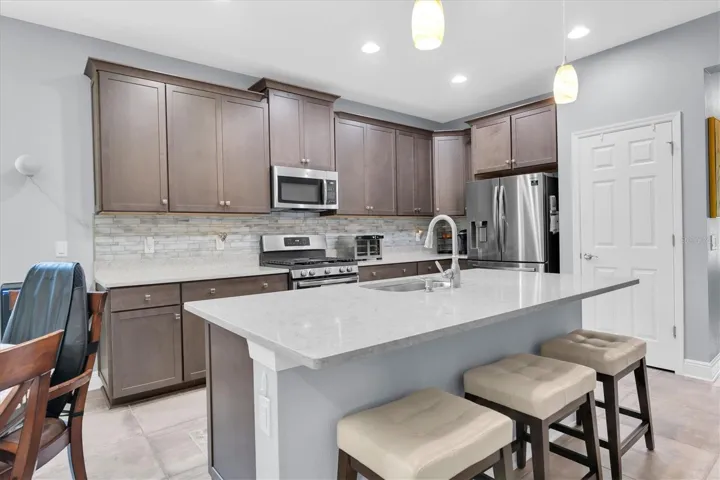 QUARTZ ISLAND WITH ROOM FOR BARSTOOLS