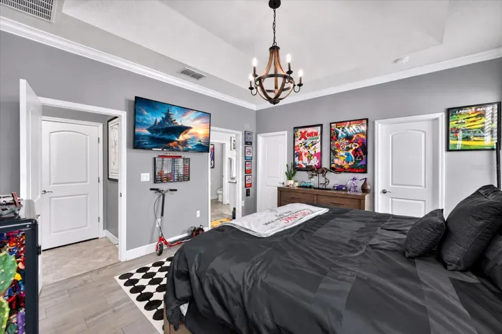 2465 Annacella Ave. -  Large master bedroom with his and hers separate walk-in closets