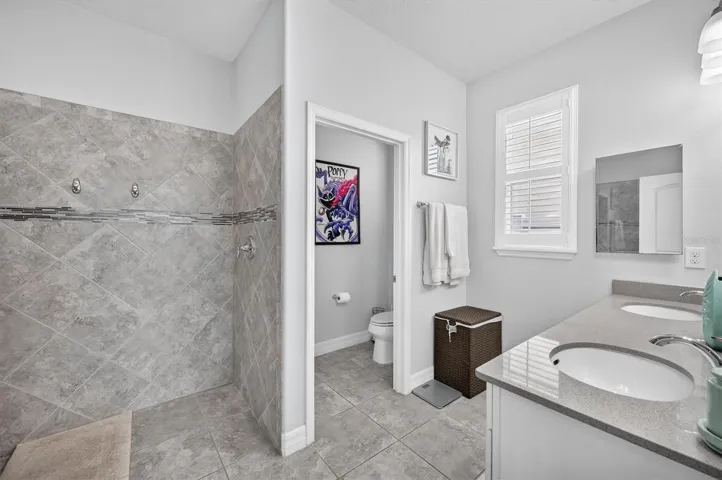 2465 Annacella Ave. - Master bathroom with adult height double vanity