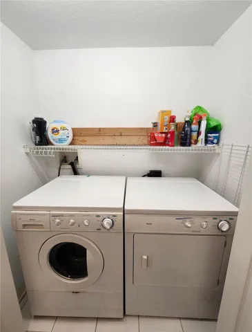 Laundry closet with full sized washer/ dryer
