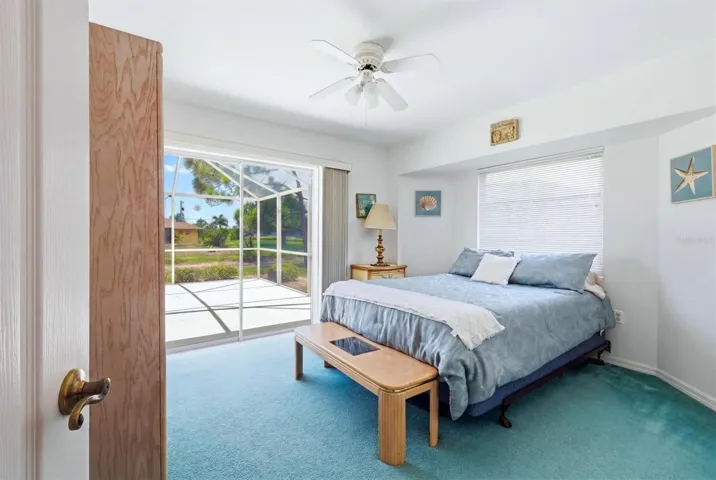 Second Bedroom, Sliding Doors Open to the Lanai &amp; Heated Pool.