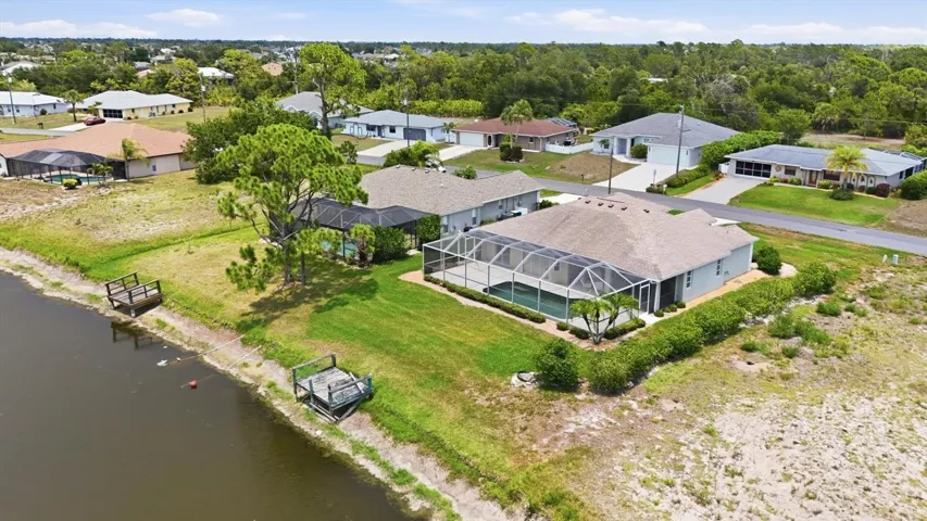 Rear Aerial View, Canal &amp; Fishing Dock.