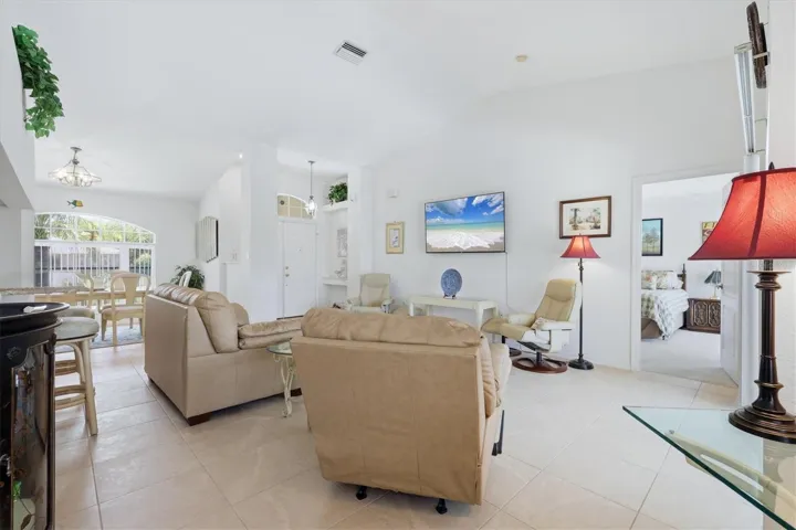 Open floor plan from L/R &amp; in the background D/R is on the left &amp; front entrance is on the right.