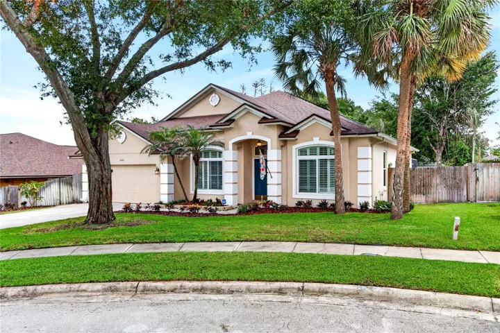 Inviting, nice sized front yard with trees & landscaping