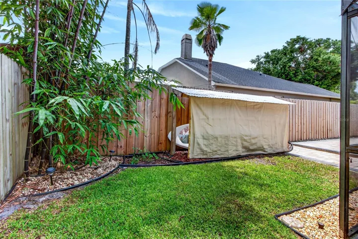 large back yard: grass & pavers