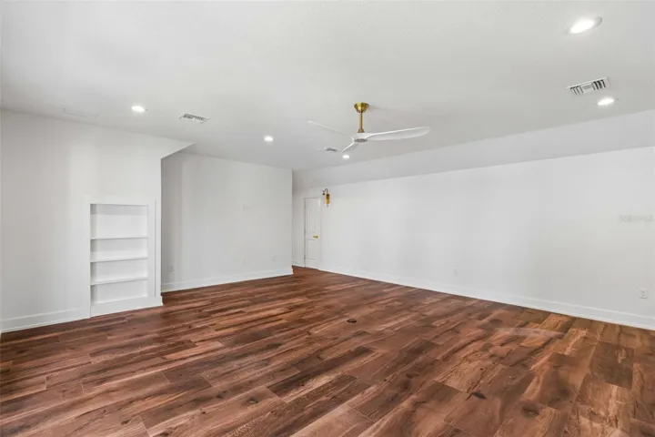 Bookshelf opens to attic storage
