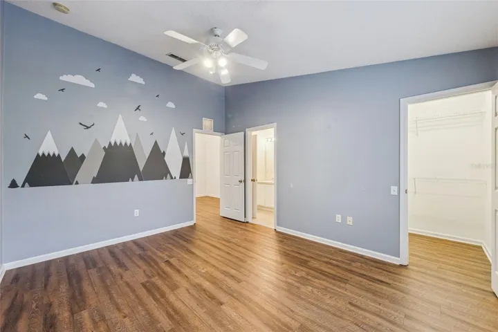 Bedroom 2 with direct access to bathroom 2 and a huge walk in closet!