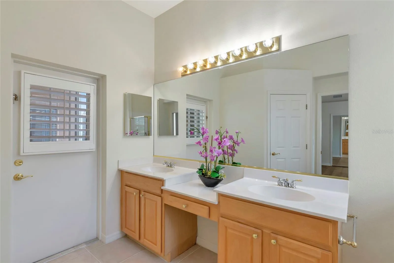 Primary bath door to lanai pool &amp; spa.